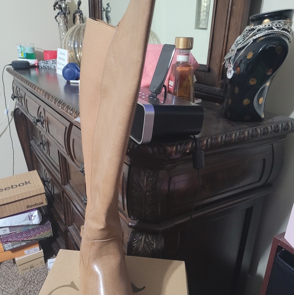 Tall, tan, over the knee, flat boot.